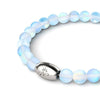 NOGU Mermaid Glass™ Studio beaded bracelet with luminous pale blue glass beads and a polished stainless steel logo clasp.