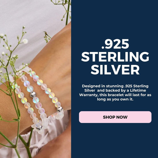 Stacked translucent iridescent beaded bracelets with polished .925 sterling silver accent beads on a wrist.