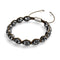 Hades | Hematite Skulls x Black GloWeave | Macrame Bracelet