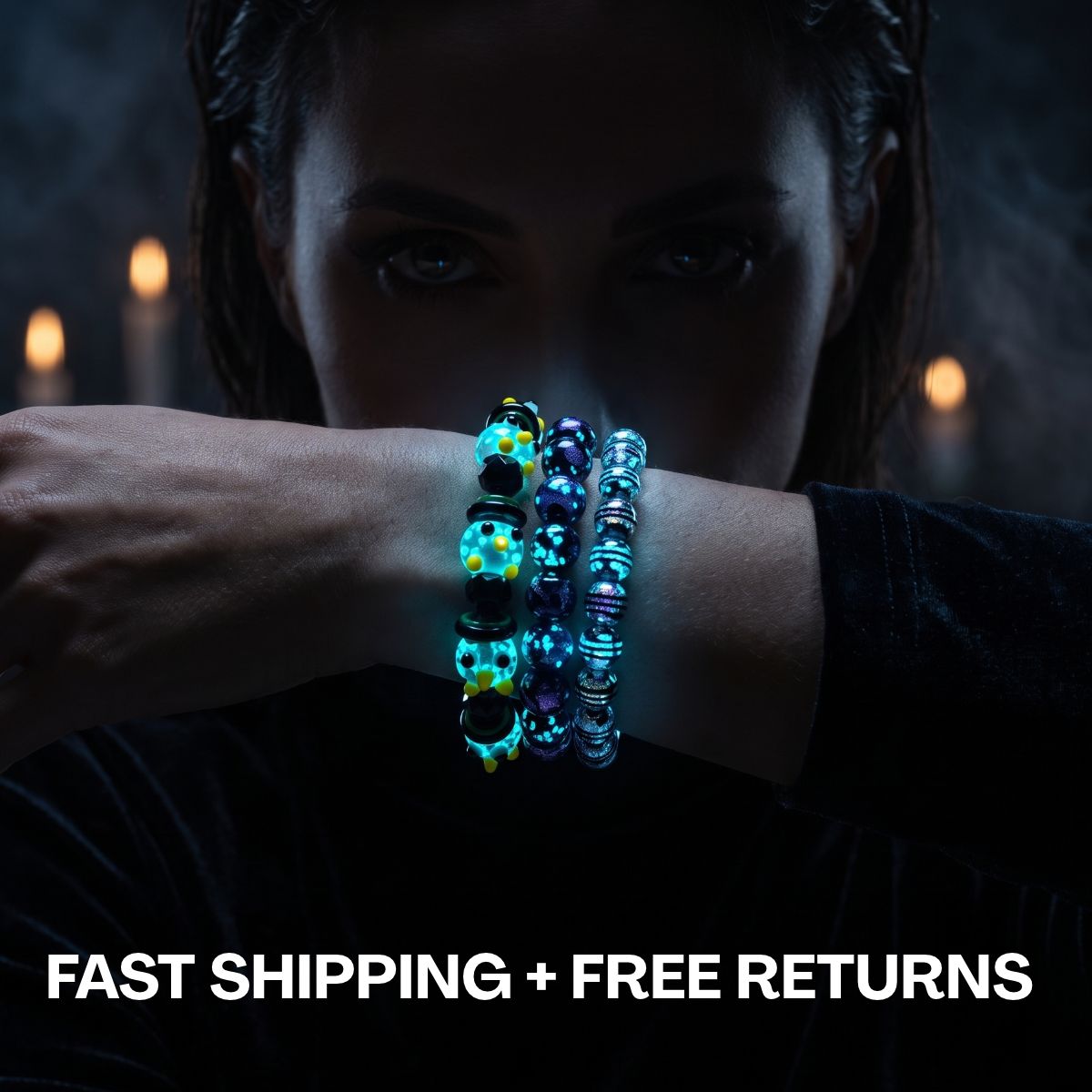 Stacked NOGU glow-in-the-dark beaded bracelets in turquoise, purple and black, worn on a wrist in moody candlelight.