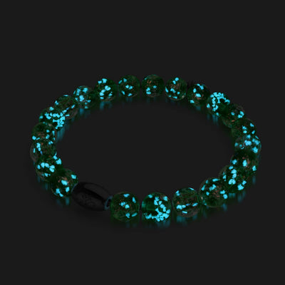 Verdant Burst bracelet with glowing green and blue Firework Glass beads featuring .925 sterling silver clasp by NOGU