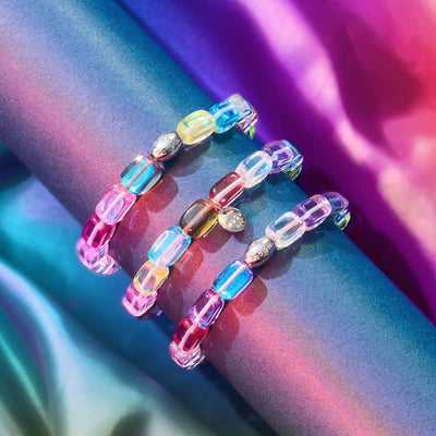 Cosmic Cascade Galaxy Glass Pebble Bracelets with iridescent multicolor beads and sterling silver details by NOGU