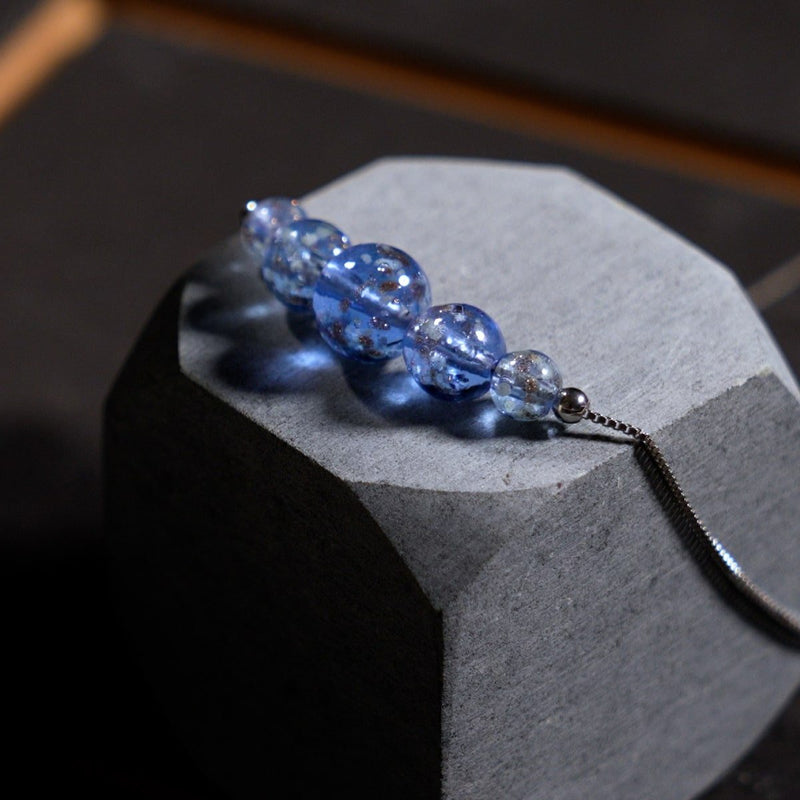 Indigo | .925 Sterling Silver | Firefly Glass Infinity Clasp Necklace