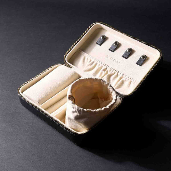 Jewelry Travel Case Deluxe open with cream velvet interior featuring four black snap hooks and drawstring pouch by NOGU