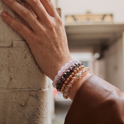 NOGU Made to Pair Black Dahlia Firefly Glass™ Diamonds Bracelet stack with luminous pink, black, and rose gold beads.