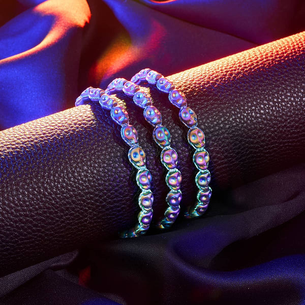 Cobalt Eclipse macramé bracelet with iridescent unicorn hematite skull beads and an adjustable blue GloWeave cord.