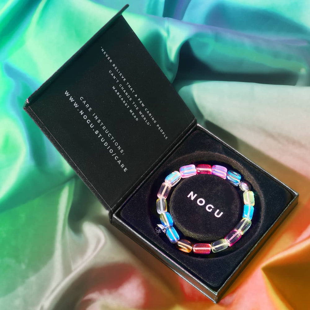 Cosmic Cascade Galaxy Glass Pebble Bracelet with multicolor beads and sterling silver by NOGU in black branded box