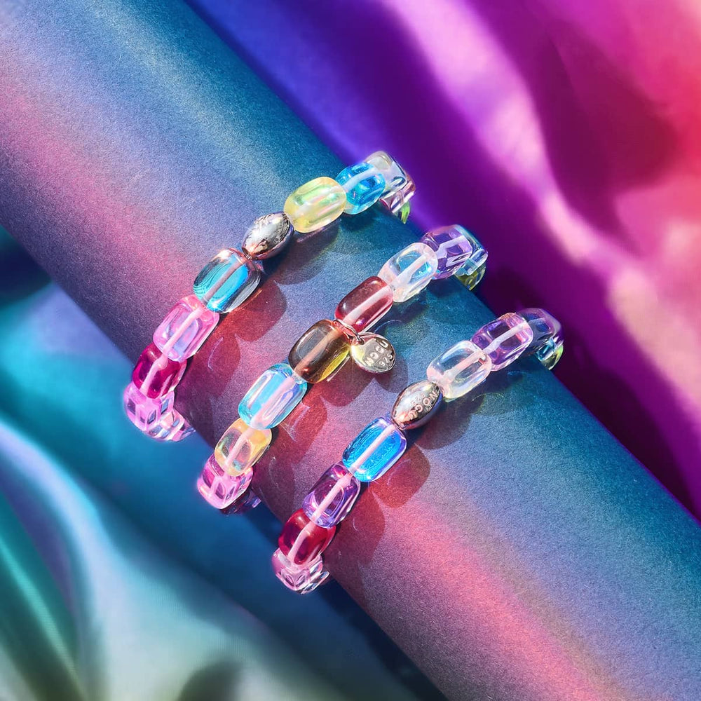 Cosmic Cascade Galaxy Glass Pebble Bracelets with iridescent multicolor beads and sterling silver details by NOGU