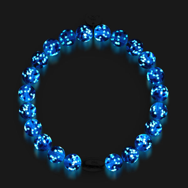 Topaz Flame bracelet with glowing blue and white Firefly Glass beads and engraved .925 sterling silver clasp by NOGU
